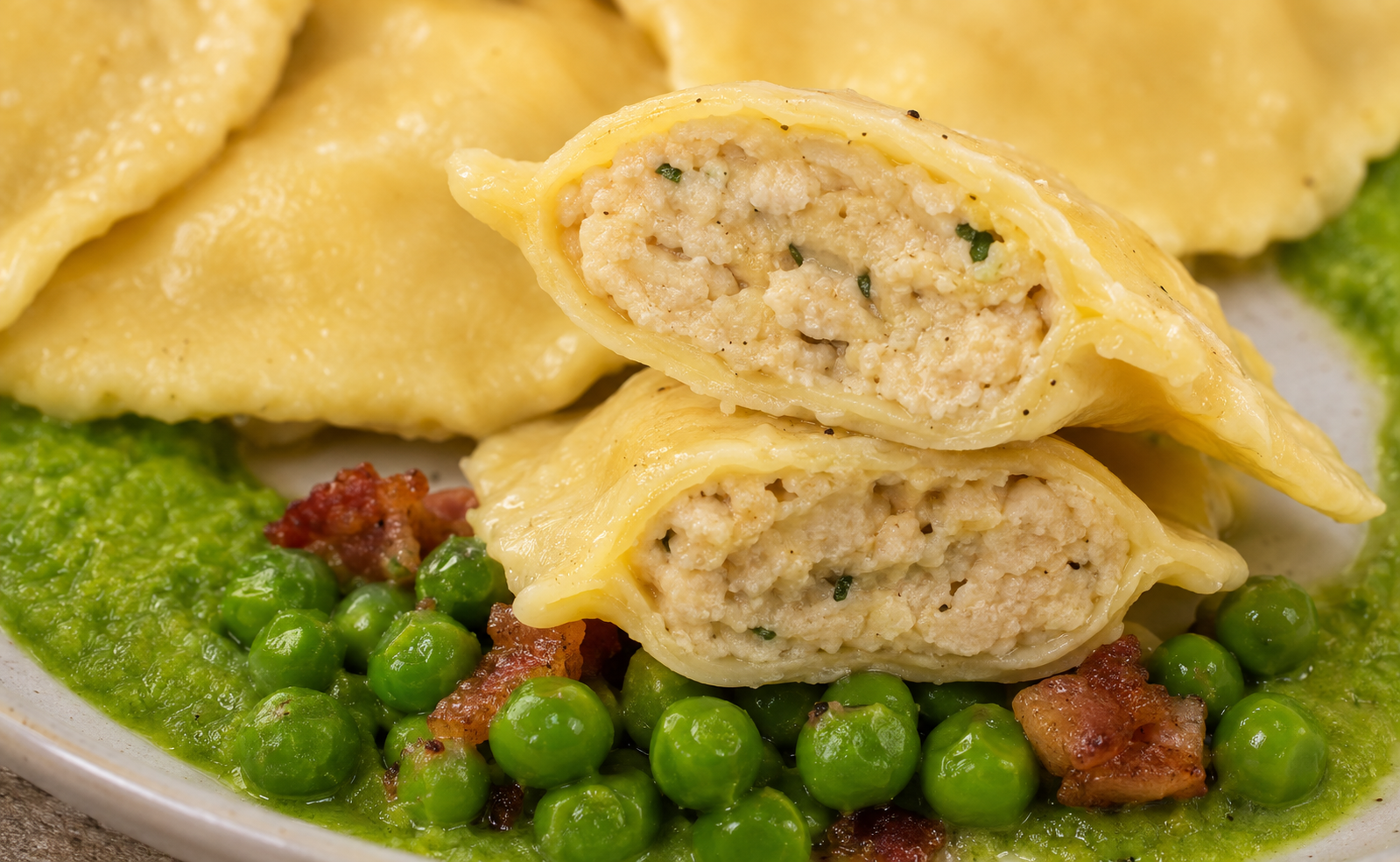 Scallop and bacon agnolotti with spring pea puree